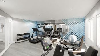 a workout room with treadmills and other exercise equipment